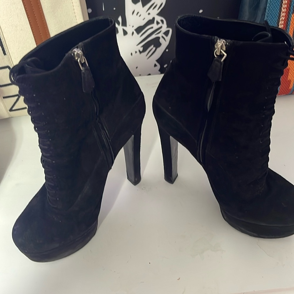 Prada black suede lace up in the front and a zipper on inside